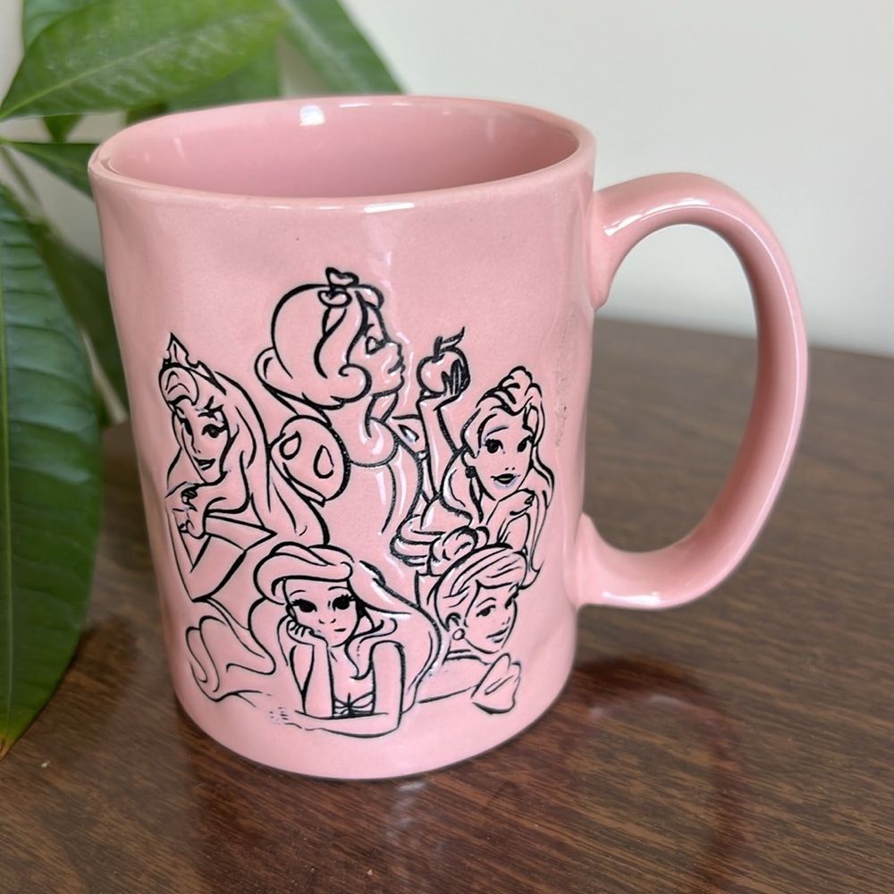 Disney Princess Pink Character Mug Featuring Snow White, Aurora, Bell, Ariel &